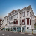 White wooden traditional houses by Bosphorus strait, Arnavutkoy, Besiktas district, Istanbul, Turkiye, in a spring day