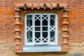 White wooden window on old red brick wall Royalty Free Stock Photo