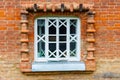 White wooden window on old red brick wall Royalty Free Stock Photo