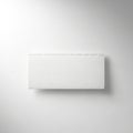 A white woven rectangular mat against a plain light grey background Royalty Free Stock Photo
