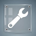 White Wrench spanner icon isolated on grey background. Square glass panels. Vector Illustration