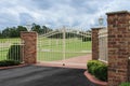 White wrought iron driveway entrance gates