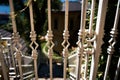 white wrought iron fence in an Italian town, details, background Royalty Free Stock Photo