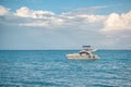 White yacht sails on the Caribbean sea, the sky is cloudy. Royalty Free Stock Photo