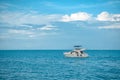 White yacht sails on the Caribbean sea, the sky is cloudy. Royalty Free Stock Photo