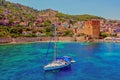 White yacht in the sea bay. Harbor of the Red Tower Alanya, Turkey Royalty Free Stock Photo