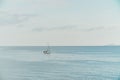 White yacht in the sea, blue sky.