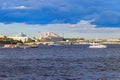 White yacht and tourist boats sailing on the Neva river in St. Petersburg, Russia Royalty Free Stock Photo