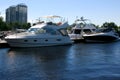 White yachts on harbor.