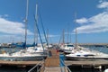 White yachts lined up at the dock Royalty Free Stock Photo