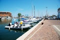 White yachts in the port are waiting. The sea is calm. Royalty Free Stock Photo