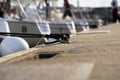 White yachts in a row moored with rope to rope from the yacht on the deck tied around Royalty Free Stock Photo
