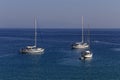 The yacht sails moored on the open sea region of Epirus, Greece Royalty Free Stock Photo