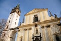 White and yellow baroque St. Stephens Cathedral at Dome Square, Church with observation bell clock tower at Dome hill, sunny day,