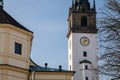 White and yellow baroque St. Stephens Cathedral at Dome Square, Church with observation bell clock tower at Dome hill, sunny day,