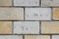 The white and yellow brick wall closeup Royalty Free Stock Photo