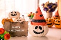 White and yellow ghost pumpkins with witch hat Royalty Free Stock Photo