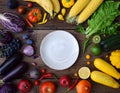 White, yellow, green, orange, red, purple fruits and vegetables on wooden background.  Healthy food. Multicolored raw food and Royalty Free Stock Photo