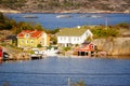 White and yellow house near fjord Kragero, Portor