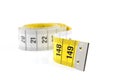 White and yellow measure tape in closeup Royalty Free Stock Photo