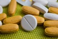 White and yellow medical pills Royalty Free Stock Photo