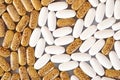 White and yellow pills as background Royalty Free Stock Photo