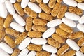 White and yellow pills as background Royalty Free Stock Photo