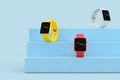 White, Yellow and Red Modern Smart Watch Mockups on a Blue Product Presentation Podium Cube. 3d Rendering