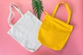 White and yellow tote bag canvas fabric, Cloth shopping sack mockup