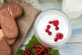 White yogurth with currant and raspberries