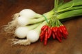 White young onions with red pepper Royalty Free Stock Photo