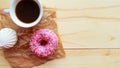 White zefir, coffee cup and pink donut on wooden table, top view. Royalty Free Stock Photo
