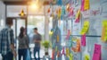 Whiteboard Full of Colorful Sticky Notes in Dynamic Work Environment Royalty Free Stock Photo