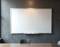 Whiteboard in meeting room setting. Blank whiteboard on textured wall. Modern office concept for presentation or workspace. Clean Royalty Free Stock Photo