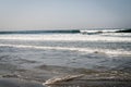 Whitecap ocean waves approach Sandy Beach