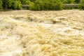 Whitecaps and Whirlpools Can Be Seen in a Turbulent River after Heavy Rains.