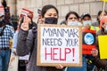 WHITEHALL, LONDON, ENGLAND- 31 March 2021: Protesters pictured at a protest against Myanmar`s military coup