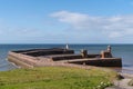 Whitehaven Cumbria UK The West Pier Lighthouse and harbour wall