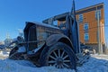 Old ruined truck as a decoration at the crossroad in Whitehorse