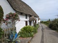 A thatched cottage at the coast in Church Cove, Cornwall, England