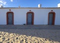 Whitewashed fishermen huts, converted into tourist facilities, Tavira, Portugal