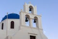 Whitewashed houses and blue dome church by the Aegean sea, Santoriniin Oia, Santorini, Greece. Famous blue domes in Oia village,