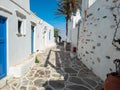 Whitewashed houses blue doors cobblestone street at Kastro village Sifnos island Cyclades Greece