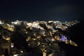 Whitewashed Houses on Cliffs with Sea View at Night in Oia, Santorini, Cyclades, Greece Royalty Free Stock Photo