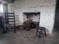 Stone fireplace in basement of house Royalty Free Stock Photo