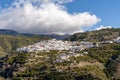 Whitewashed village in the hills above Malaga in the Andalusian backcountry Royalty Free Stock Photo