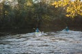 Whitewater kayaker paddling on river Royalty Free Stock Photo