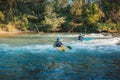 Whitewater kayaker paddling on river Royalty Free Stock Photo