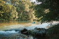 Whitewater kayaker paddling on river