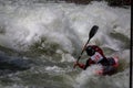 Whitewater kayaker races down stream Royalty Free Stock Photo